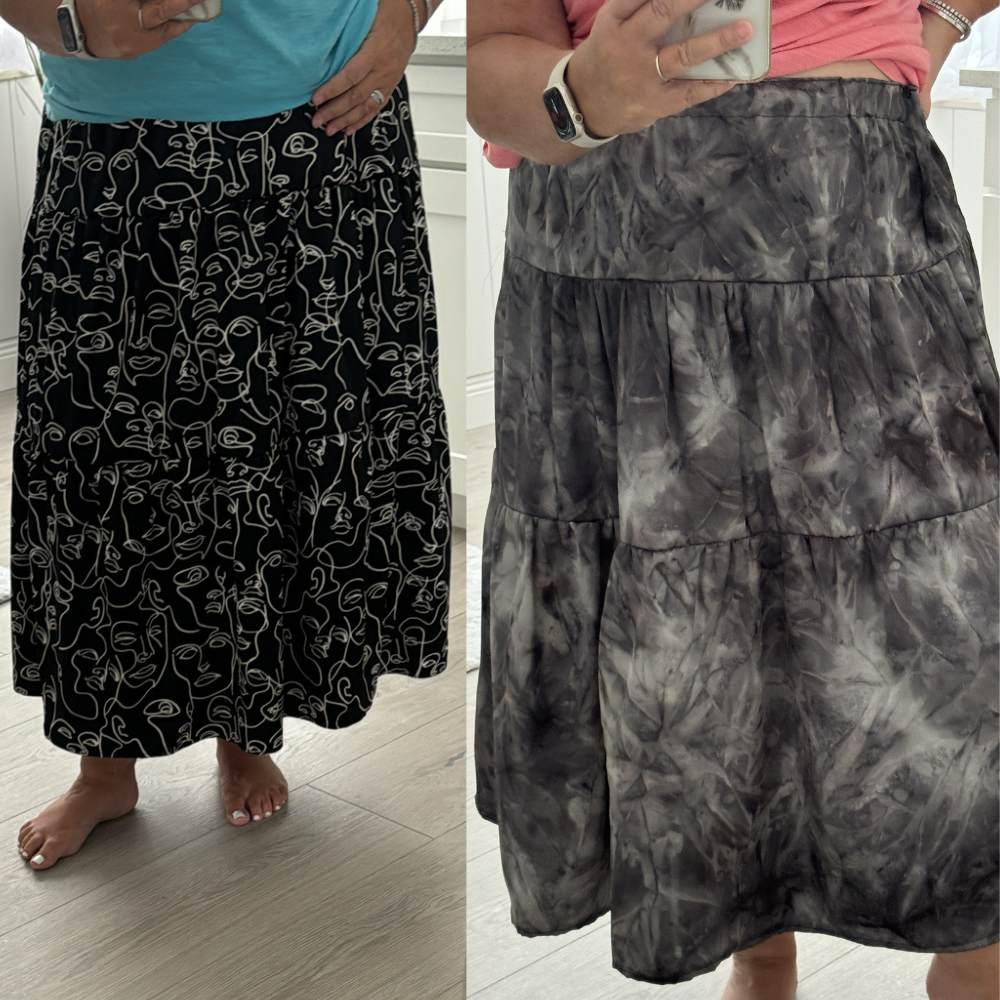 Two handmade skirts using the same pattern — one in black abstract print, one in grey tie-dye tiered fabric
