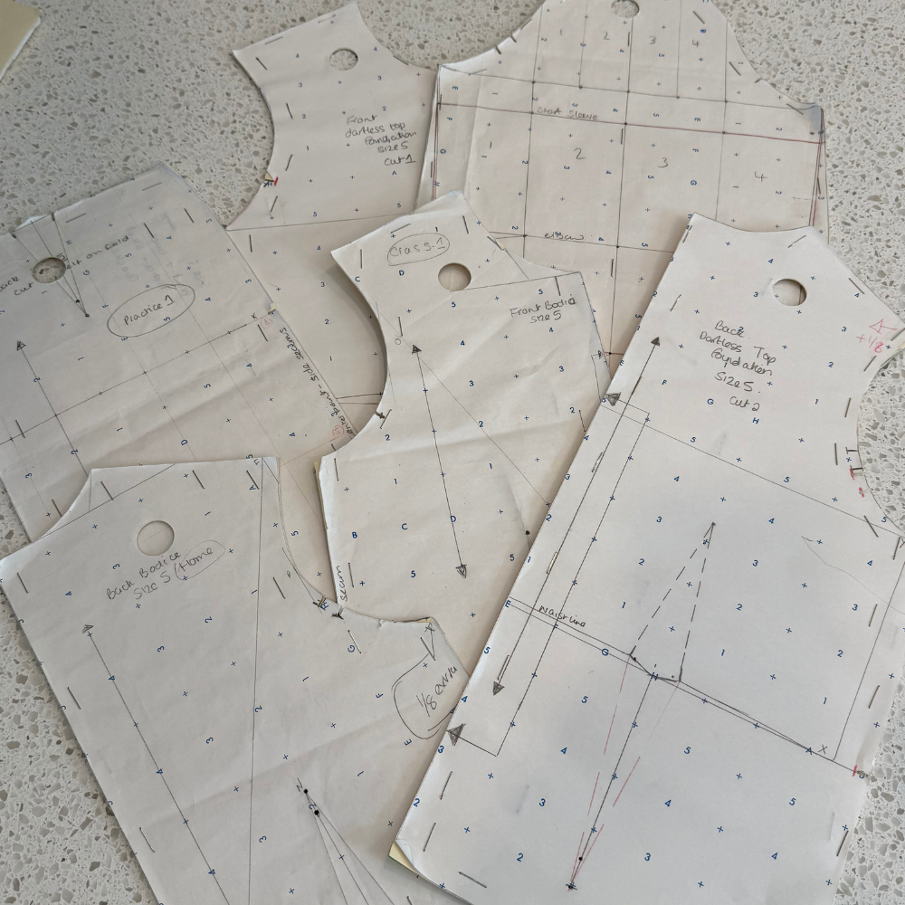 Learning children's pattern making taught me structure through smaller scale. From conquering fractions to drafting my first shirt from scratch—where drafting stopped feeling theoretical and started feeling possible.