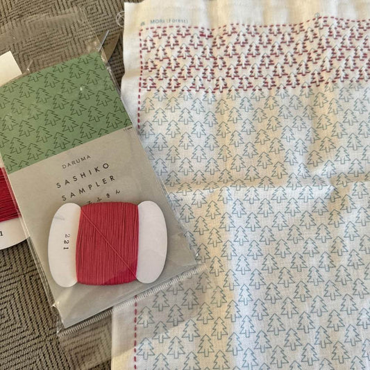 apanese Sashiko hand stitching sampler kit with red thread found in Tokyo