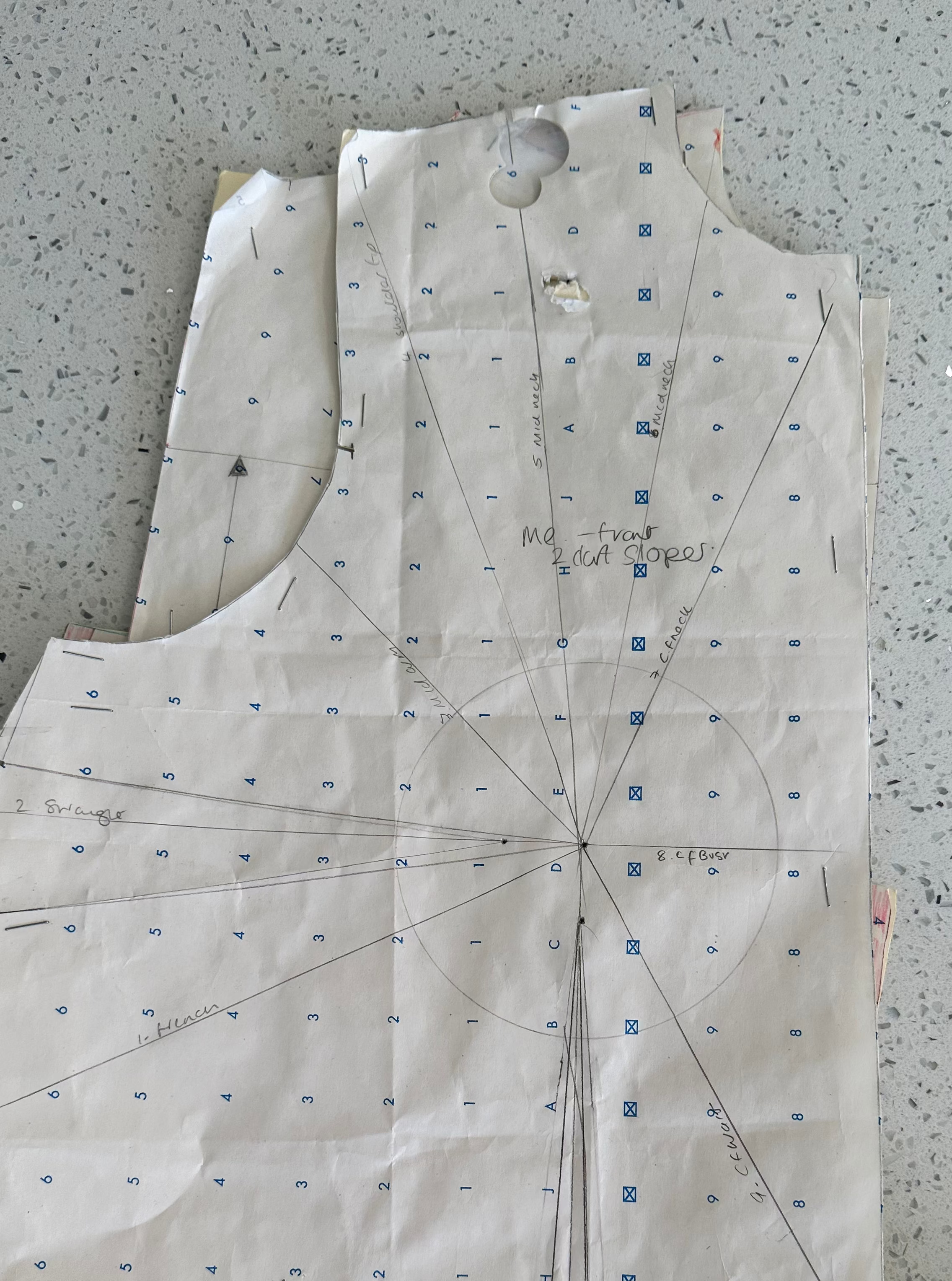 Nicola's handmade bodice block pattern piece laid flat on a table
