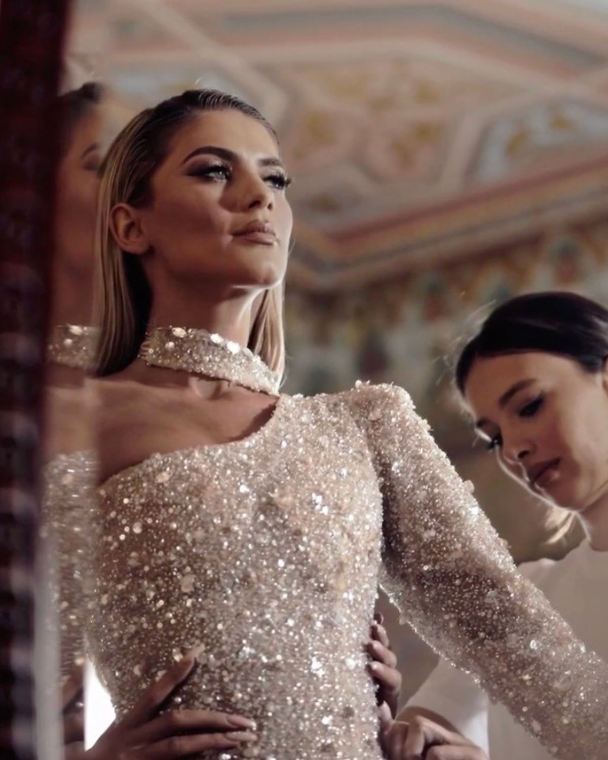 After Stilettos affiliate link — couture hand-beading sewing masterclass featuring close-up of embellished evening gown construction
