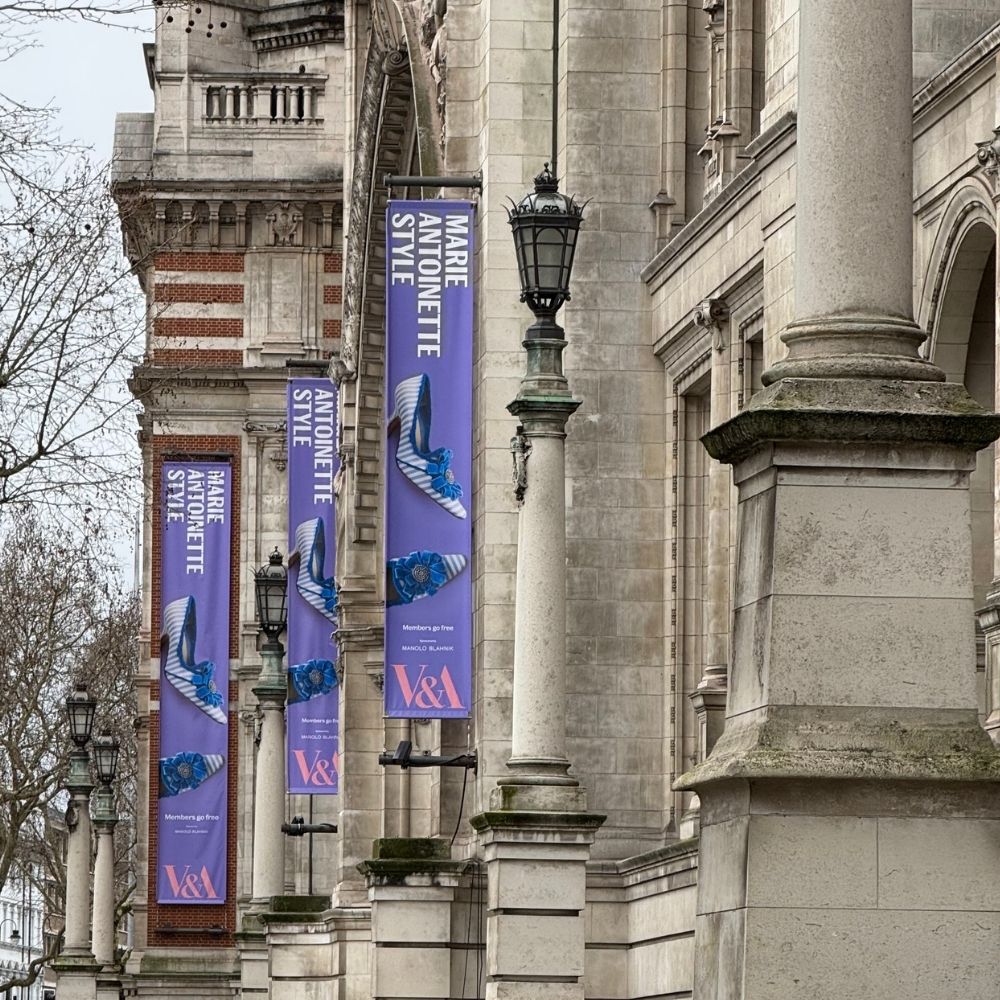 V&A Museum exterior with Marie Antoinette Style Manolo Blahnik exhibition banners — After Stilettos exhibitions and fashion culture