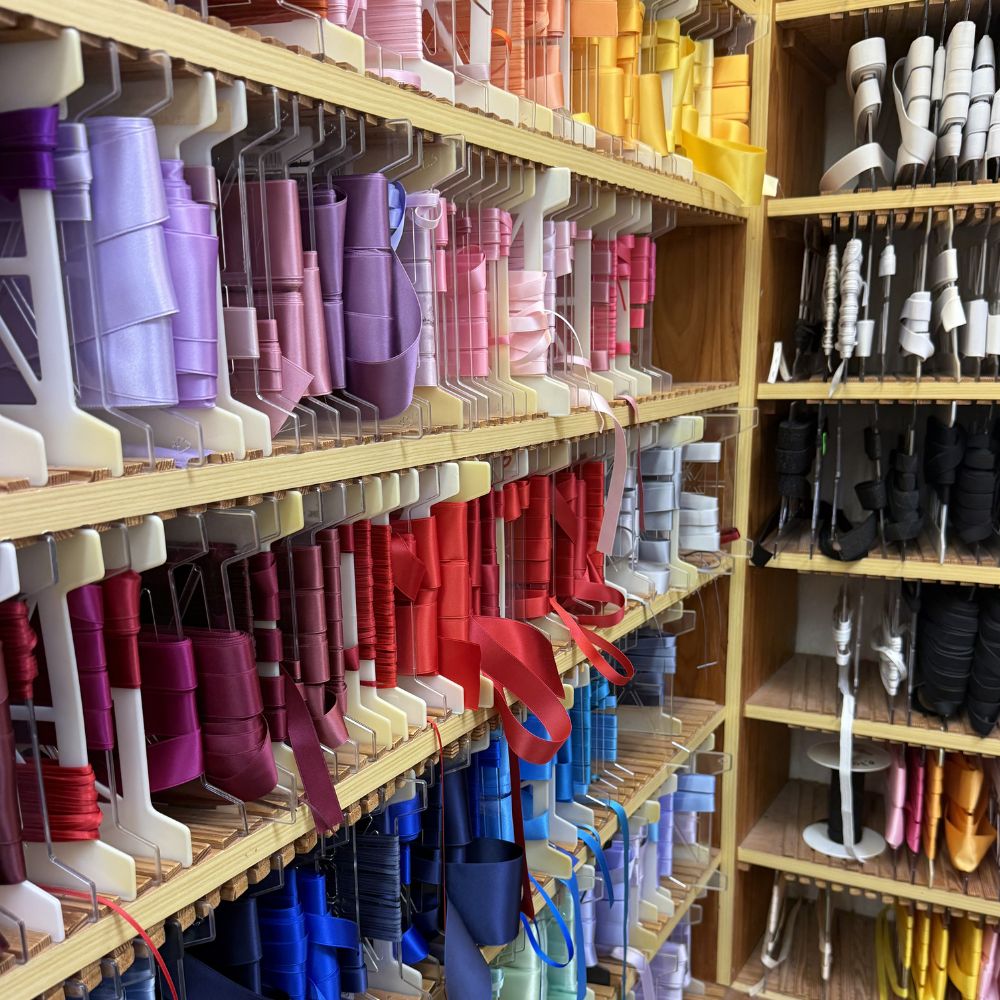 shelves of colorful ribbons from Macculloch & Wallis London