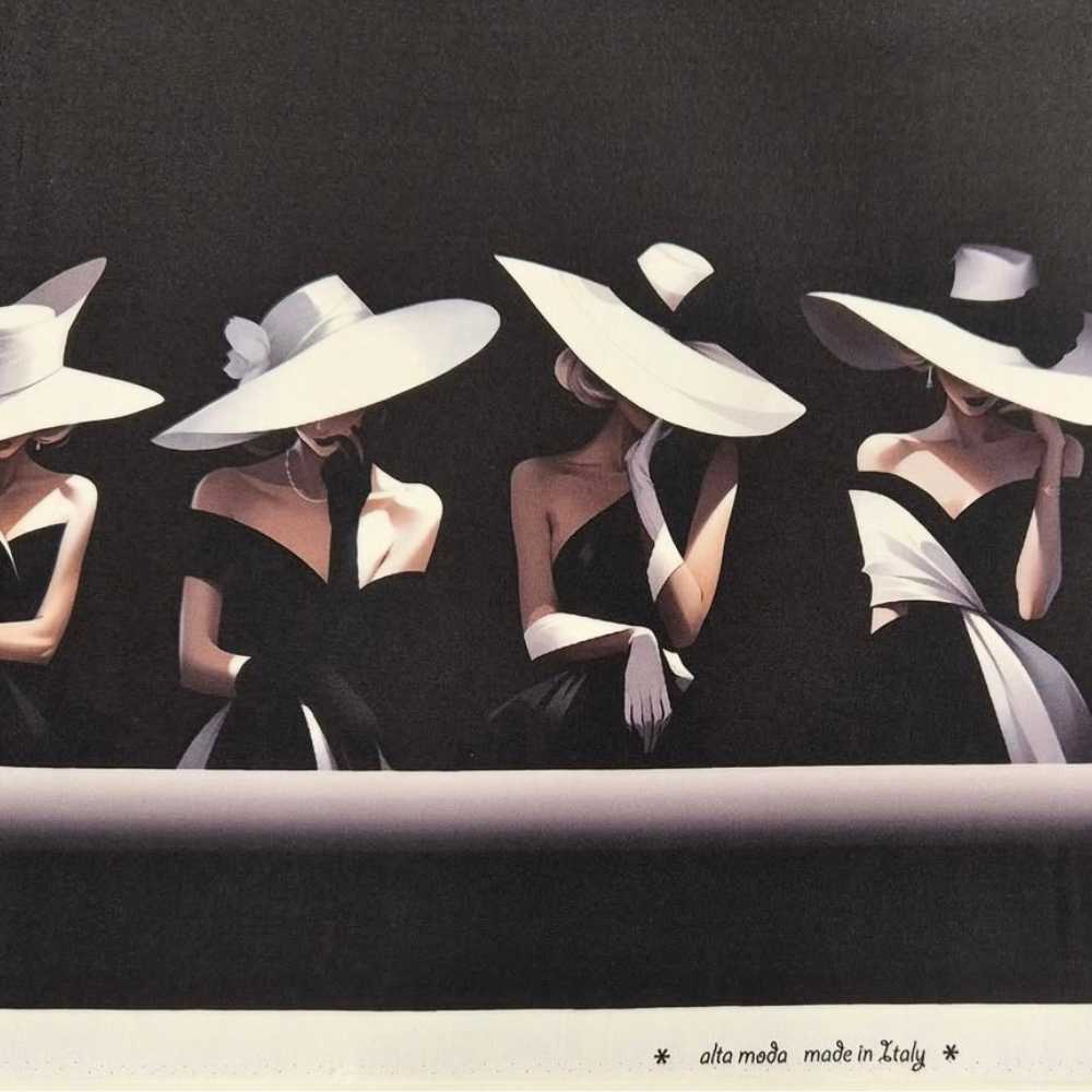 Black Italian silk-and-wool fabric printed with a row of women in wide-brimmed white hats and off-shoulder gowns, "alta moda made in Italy" along the selvedge.