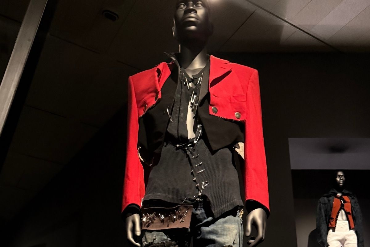 Mannequin in a red military-style jacket and black shirt on display at Superfine: Tailoring Black Style, The Met, New York

